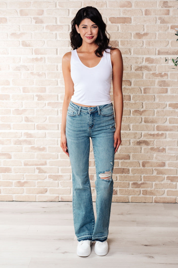 Isla Mid Rise Distressed Released Hem Bootcut Jeans by Judy Blue