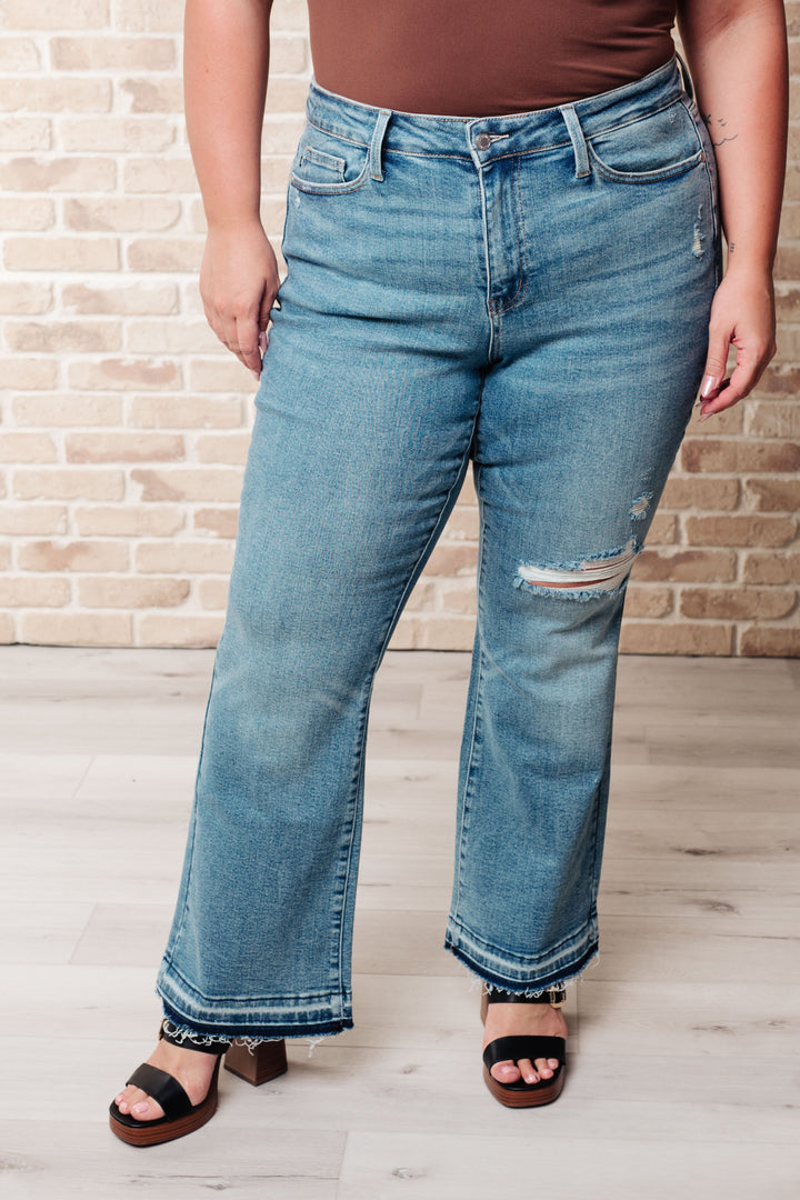 Isla Mid Rise Distressed Released Hem Bootcut Jeans by Judy Blue