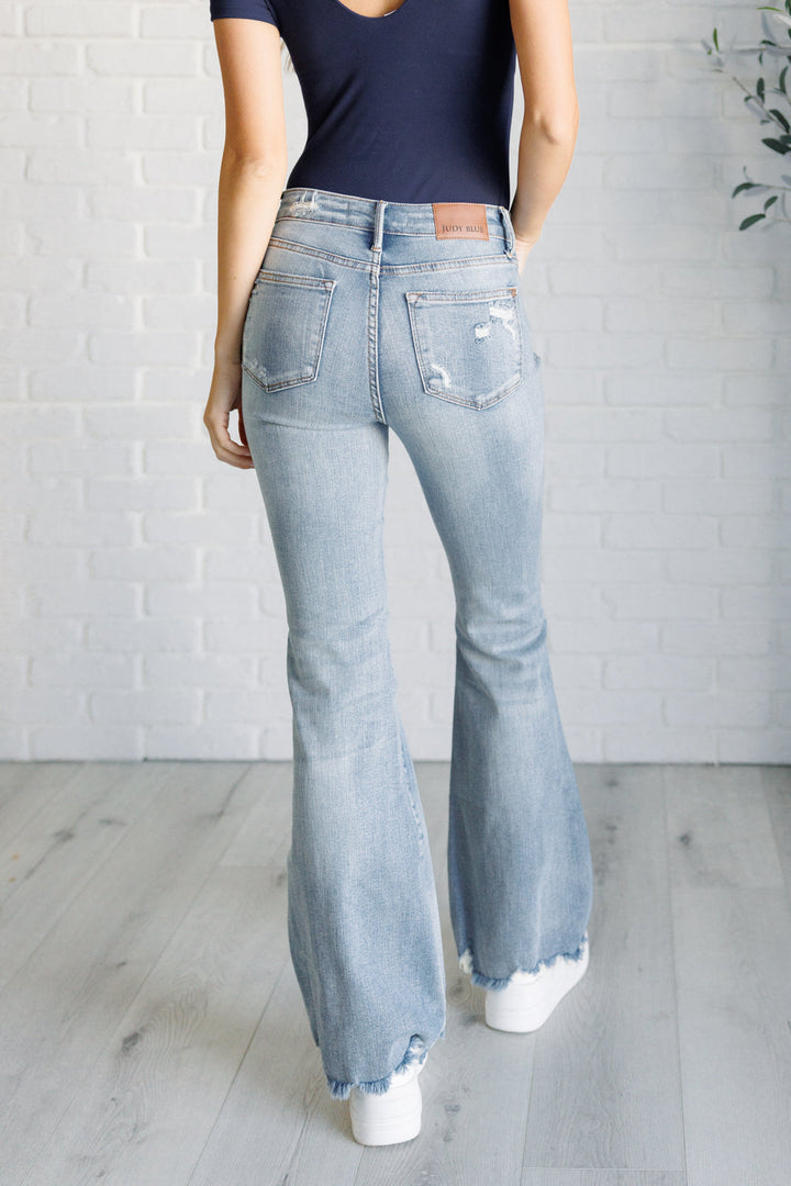 Caroline Mid Rise **TUMMY CONTROL** Distressed Flare Jeans by Judy Blue